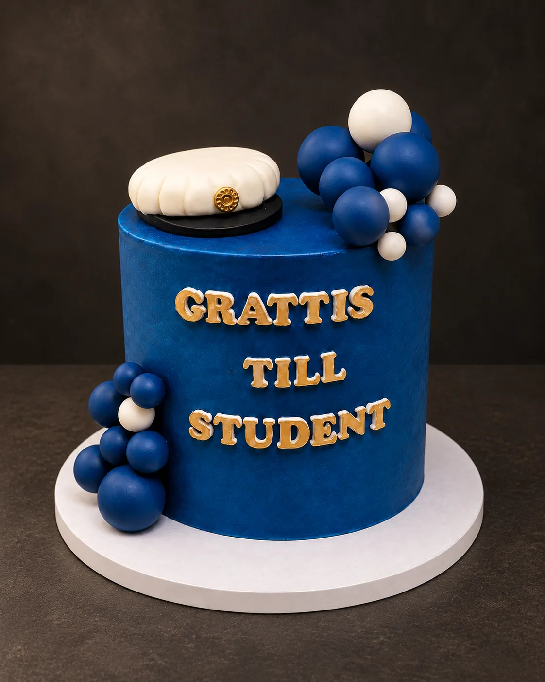 Blue graduation cake
