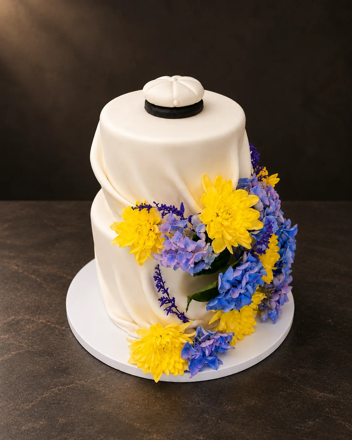 Cake with yellow and blue flowers