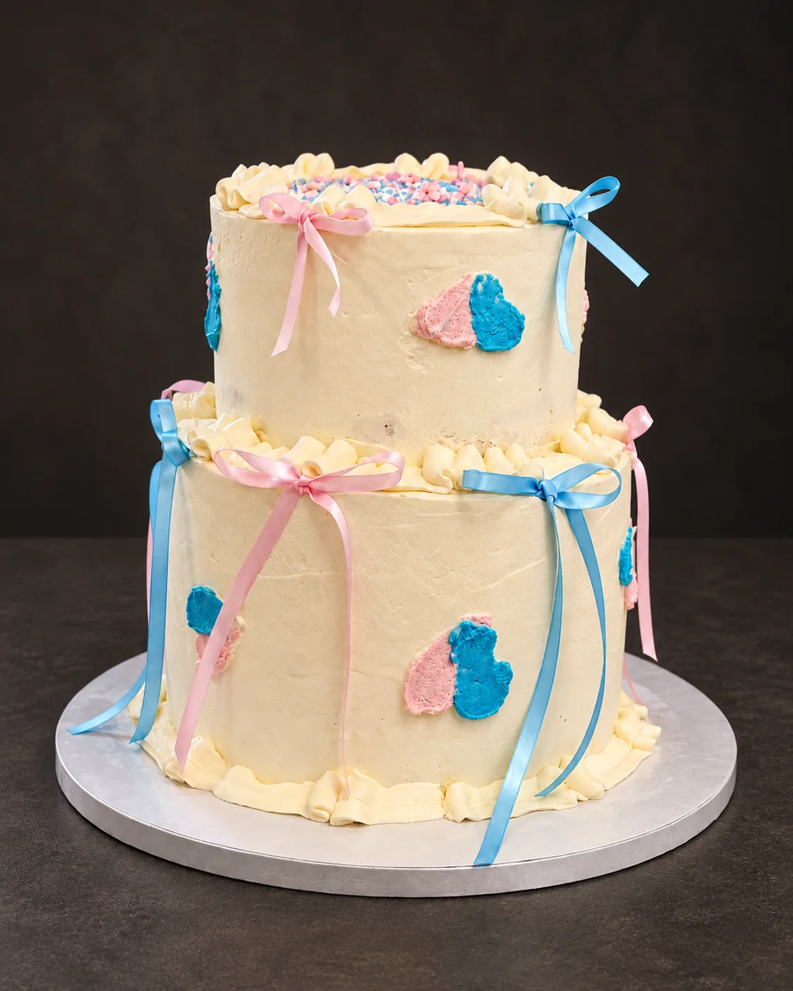 Pink and blue two-tier cake